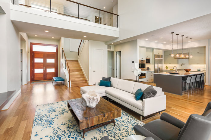 Modern open-concept home interior with living room and kitchen